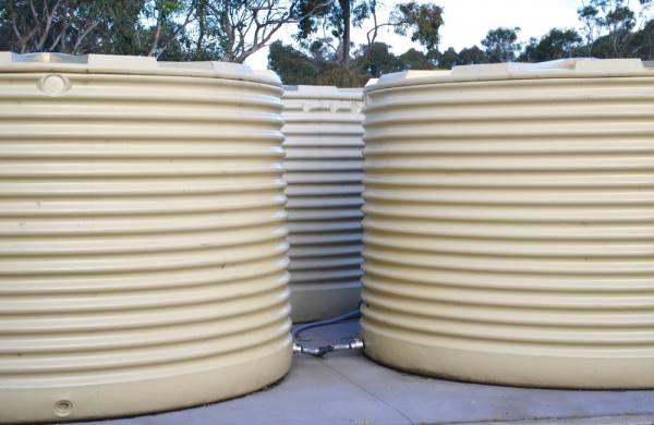 3 Rainwater Tanks In The Backyard